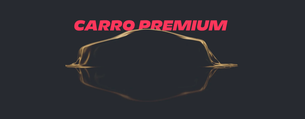 Carro coberto por um pano preto, com o texto 'carro premium'